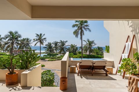 Enjoy breathtaking ocean views from this private patio, perfect for outdoor dining and relaxation.