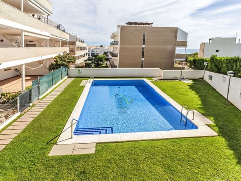 Plant, Property, Water, Swimming Pool, Building, Sky, Cloud, Azure, Window, Condominium