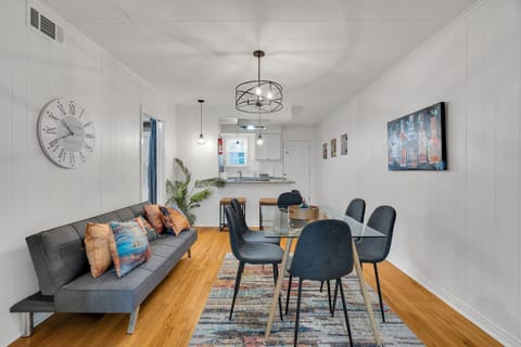 Relax in style! This bright and inviting living space offers the perfect spot to unwind after a day of exploring New Orleans. Modern comforts meet local charm in this serene retreat