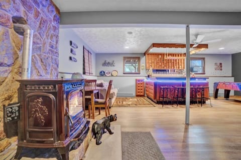 Lounge & Bar Area with a Classic Vibe – A stylish entertainment space blending rustic charm with modern bar lighting, creating the perfect atmosphere for socializing.