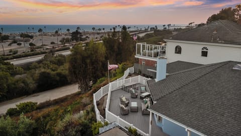 View of the large backyard deck overlooking the ocean 