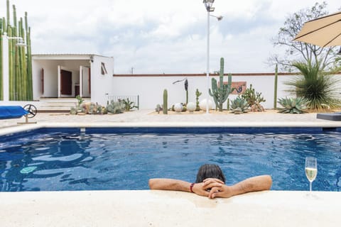 Solar heated pool with outdoor shower and  bathrooms. Lounges and umbrellas.