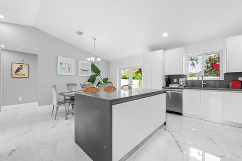 The big kitchen island is the gathering spot for your whole group