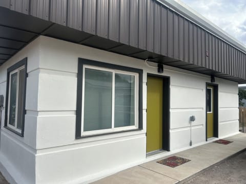 Outside view.  Parking on the left side for guests.  Fully air conditioned.