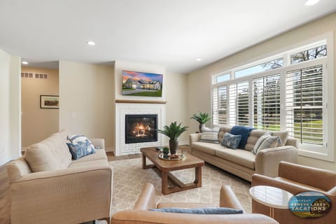 Living room with gas fireplace, smart TV