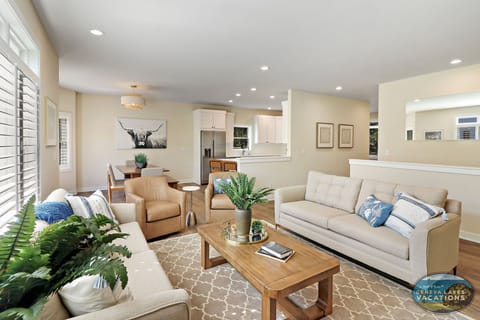 Main living area with seating, smart TV