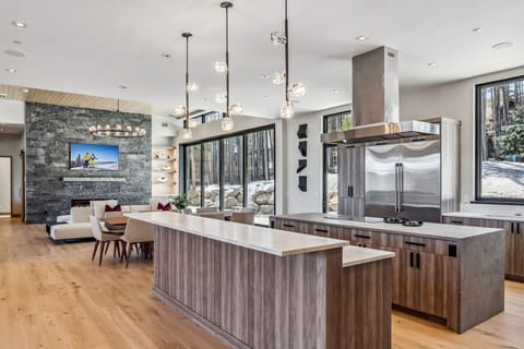 The kitchen is outfitted with Monogram appliances, and designed for superior performance