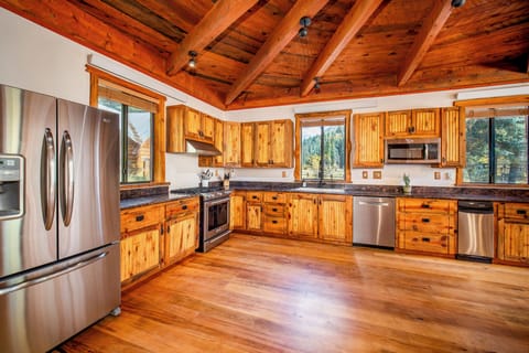 A spacious chef's kitchen has all the appliances and equipment you need!