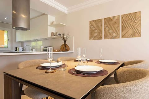 Elegant dining area with cozy seating, artistic decor, and a warm ambiance—perfect for gathering and making memories.







