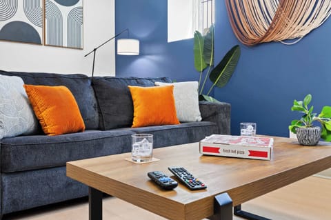Living Room: An open-plan design with plenty of natural light and contemporary decor, making you feel right at home.