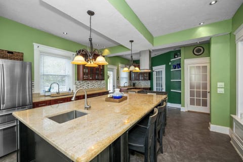 Sip morning coffee or grab a bite at the kitchen counter, with seating for 3