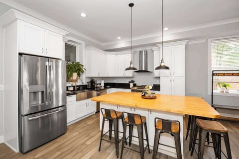 Sip morning coffee or enjoy a snack at the kitchen counter, with seating for 5