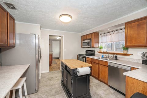 The spacious kitchen offers ample storage & all the comforts of home