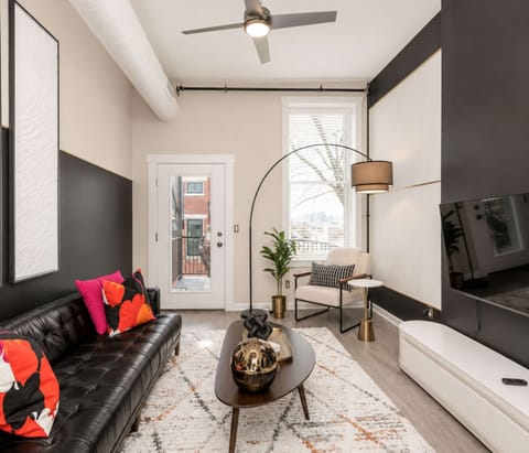 Lounge in style in the living room & stream your favorites on the smart TV