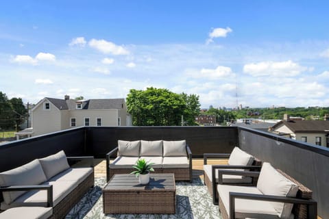 Unwind amidst fresh air and scenic vistas on the rooftop deck!