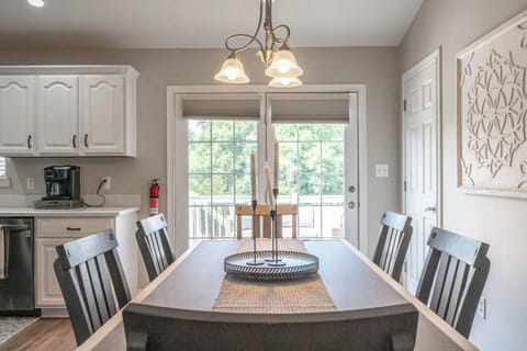 Dining area with table for 6 , and deck access