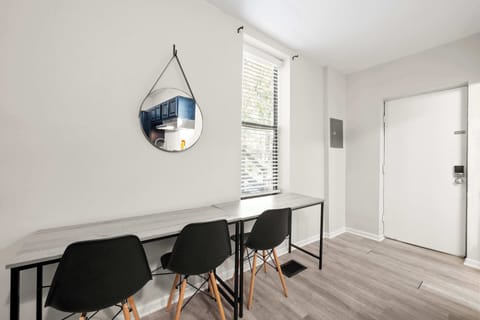 Enjoy mealtimes or catching up on emails at the dining table, seating 3