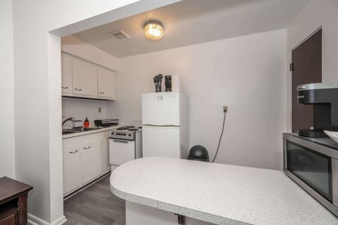 The efficient, open kitchen offers ample space & all the comforts of home