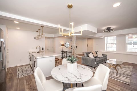 Unit 101: Enjoy seating for 4 at the table in this unit’s open dining area