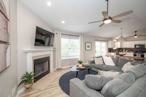 Curl up in the chic living room & enjoy a movie night at home