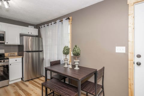 Gather for meals together at the dining table, seating 4