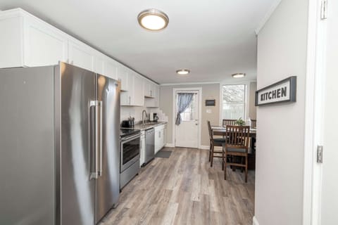 The bright, cozy kitchen offers ample space & all the comforts of home