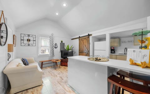 Enjoy the breezy, open floorplan of this adorable cottage