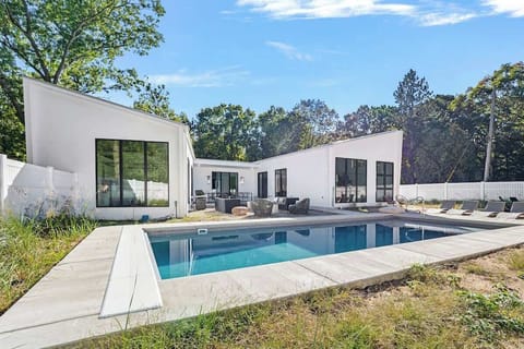 Architectural beauty meets poolside bliss. Ready to dive into relaxation?