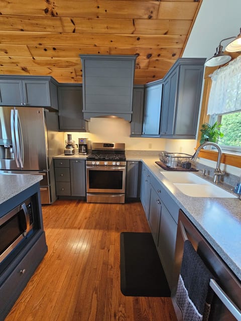 Fully equipped kitchen with a gas stove