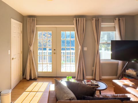 Living room: Facing large deck for ample natural light 