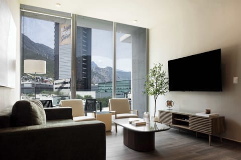 Stylish living room with a Smart TV and incredible mountain views.
