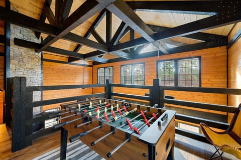 Have a blast playing foosball and other games in the Loft Bedroom.