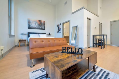 Living Room: Cozy studio unit featuring a comfortable queen bed for restful nights!