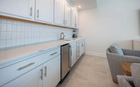 Grab a chilled drink from the fridge or create your favorite cocktail at the wet bar