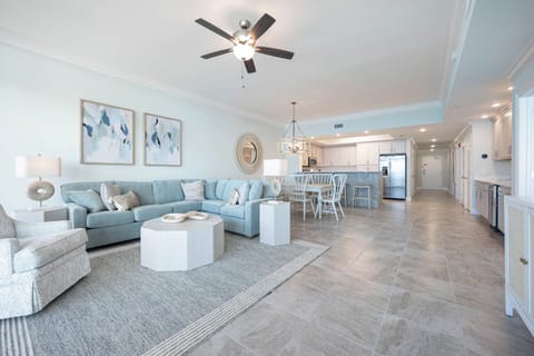 Gather in this welcoming living space and enjoy stunning beach views through the windows