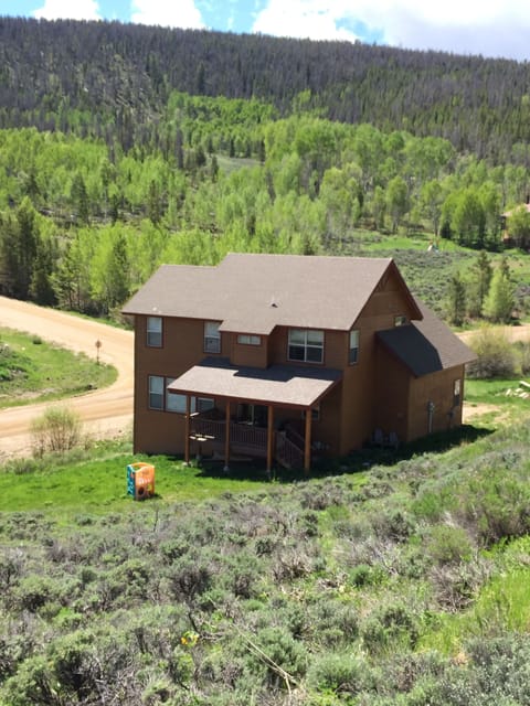Back of house showing covered deck