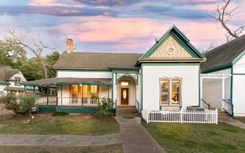 The Wildflower House – Historic folk Victorian home with three bedrooms and charming porches