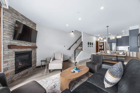 Step into a stylish and serene living space designed for relaxation and modern comfort. This newly renovated living room features a sleek fireplace as its centerpiece, perfect for cozy evenings.