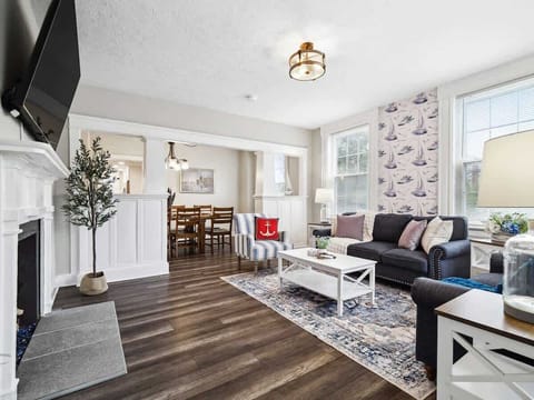 ️ Relax in our cozy, nautical-themed living room — perfect for movie nights, family chats, and making memories!