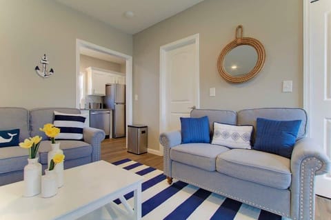 Kick back and unwind in this thoughtfully designed living space, ideal for both quiet evenings and lively gatherings. ️