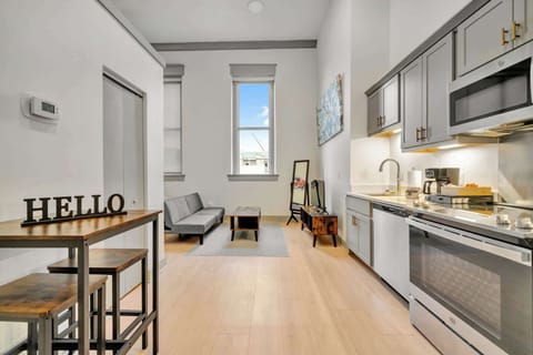 Kitchen: The perfect spot to unwind in style within the heart of the loft.
