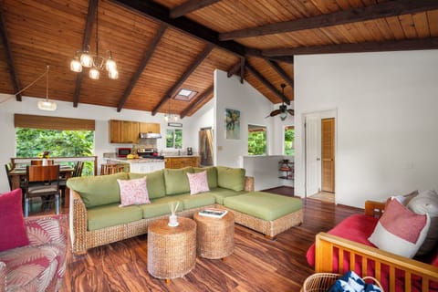 With the living room, dining room and kitchen