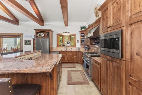 Top Level | Gourmet Kitchen | 2 Ovens, Flattop, 6 Burner Gas Stove