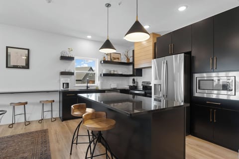 Large kitchen with luxury appliances and plenty of room to hang out together