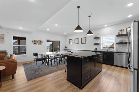 Kitchen, indoor and outdoor dining are all connected