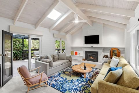 Large open living space with access to outdoor entertaining area