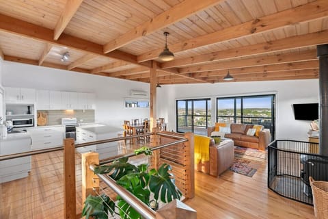 Large open plan living with access to the balcony and views