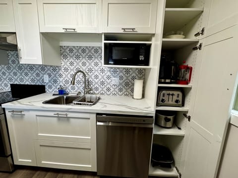 larger toaster, French press, carafe, slow cooker, electric fry pan, microwave, dishwasher (very few units offer a dishwasher)