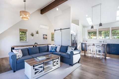 Living area and full kitchen with dining area