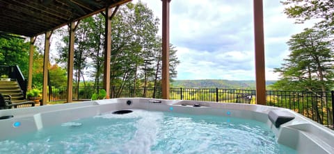 Relax and enjoy the view in the hot tub.